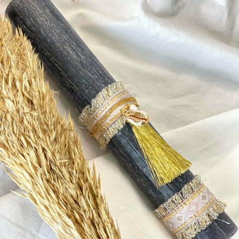 Easter candle with seashell necklace