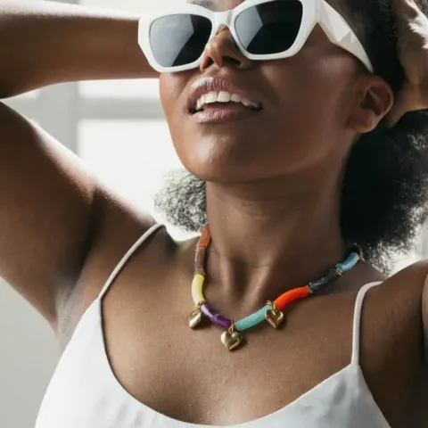 Necklace with rainbow beads, with stainless steel hearts