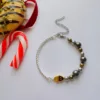 Lucky Hematite & Stripe 6 Γούρι 2025 με χάντρες αιματίτη, επίχρυσα και επάργυρα στοιχεία.