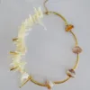 Grace necklace 3 Grace necklace – Stainless steel with gold-plated and acetate details, adjustable 45+5 cm