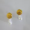 Meadow earring 7 Meadow earring made of stainless steel and freshwater pearl